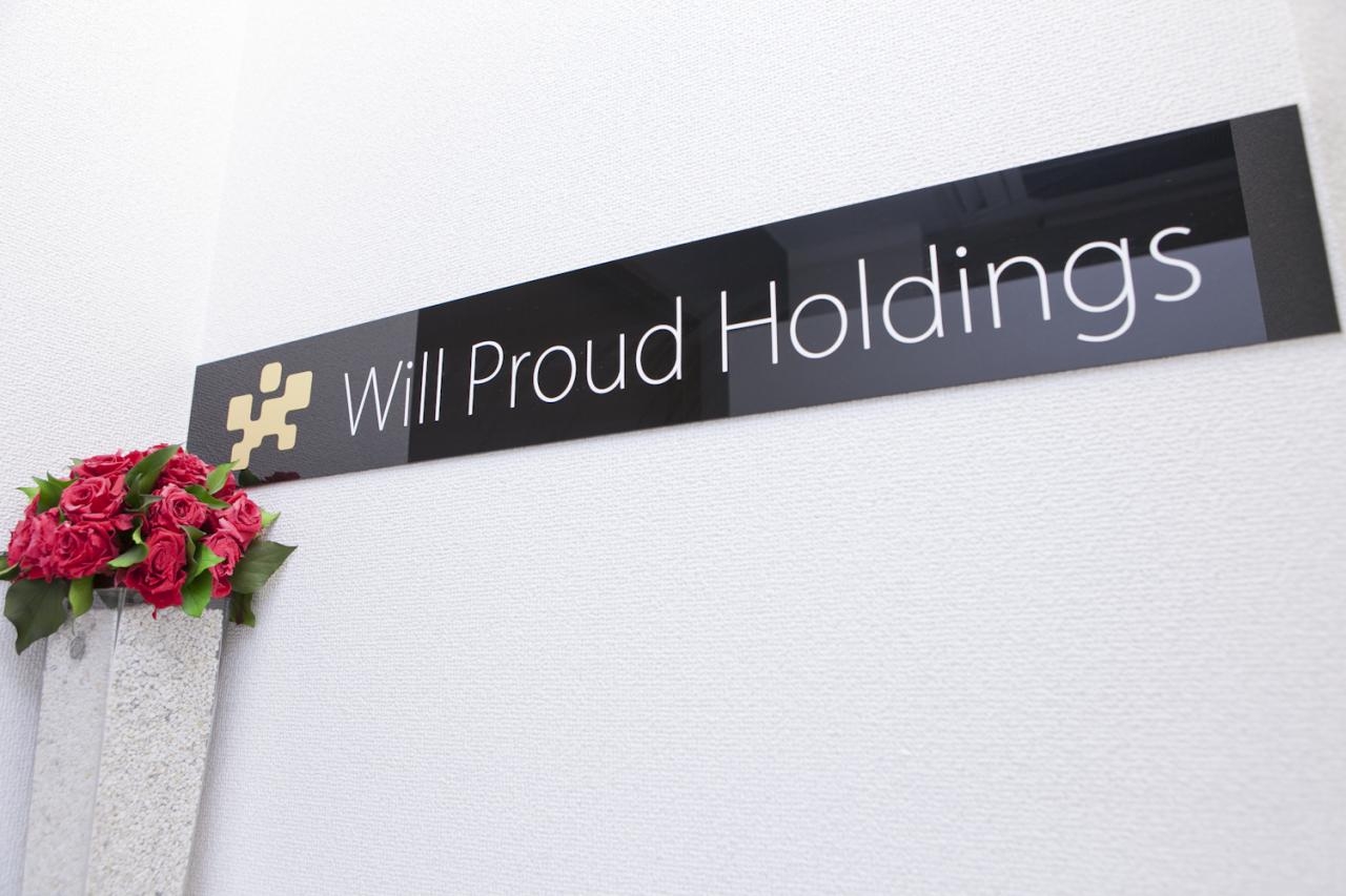 563_株式会社ウィルプラウド・ホールディングス_ロゴ